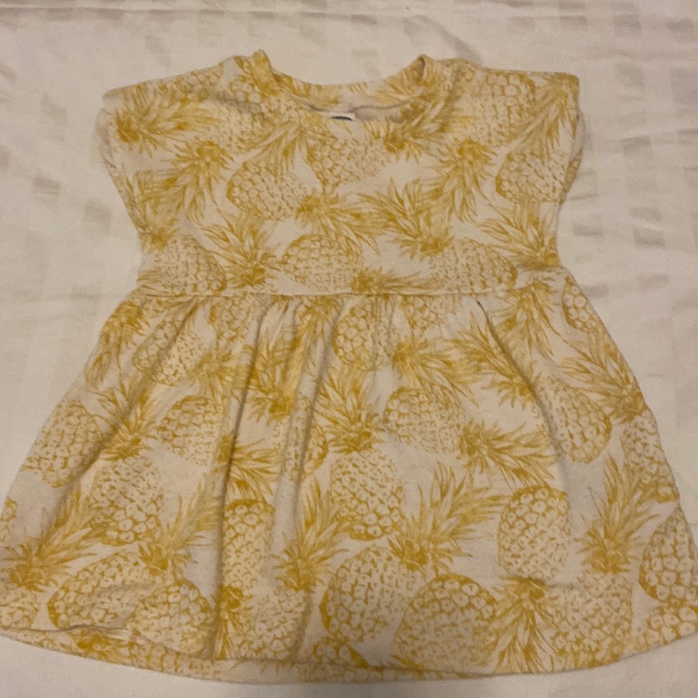 Cute yellow and white babydoll pineapple print Jersey  top by Old Navy.